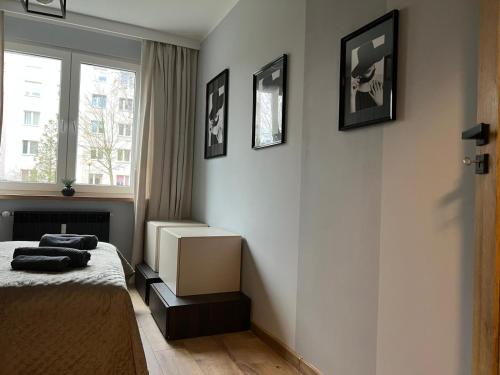 Ένα ή περισσότερα κρεβάτια σε δωμάτιο στο Apartament Francuska