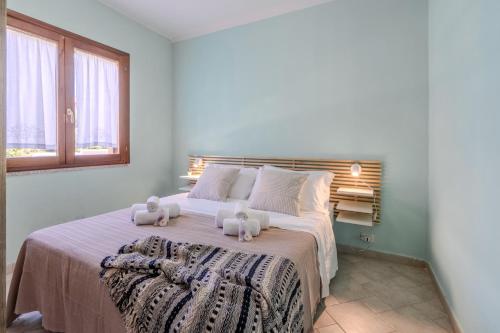 Postel nebo postele na pokoji v ubytování NOVITA' Seahorse House Spiaggia a 400m Wifi & Aria condizionata