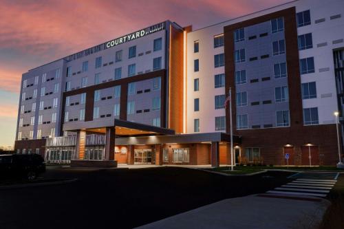 a rendering of the front of a hotel at Courtyard by Marriott Indianapolis Fishers in Fishers