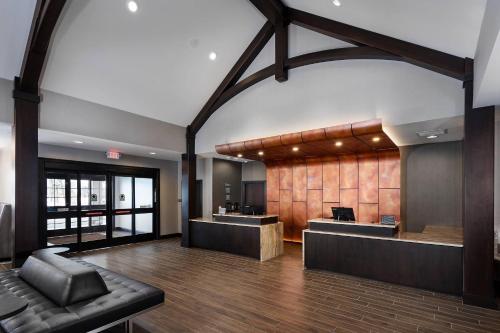 an office with a lobby with a reception desk at Residence Inn by Marriott Milwaukee Brookfield in Brookfield