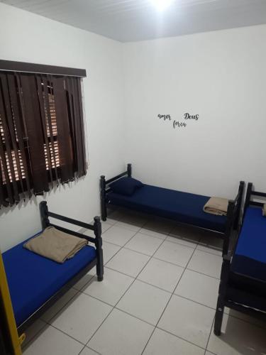 Cama o camas de una habitación en O Hostel GRU SP - Unidade Aeroporto Guarulhos - 5 Minutos de Distancia