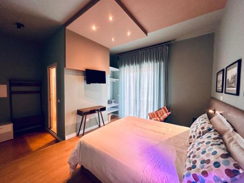 Ένα ή περισσότερα κρεβάτια σε δωμάτιο στο B&B Donna Ca'