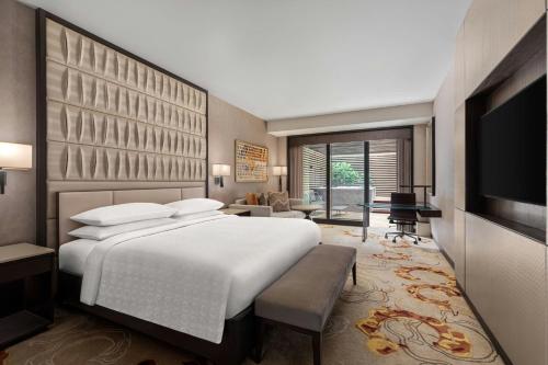 Postel nebo postele na pokoji v ubytování Sheraton Manila Hotel at Newport World Resorts