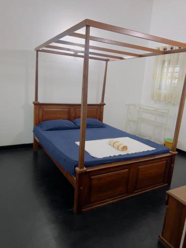 Postel nebo postele na pokoji v ubytování Goviyapana Sky Breeze