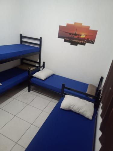 Cama o camas de una habitación en O Hostel GRU SP - Unidade Aeroporto Guarulhos - 5 Minutos de Distancia