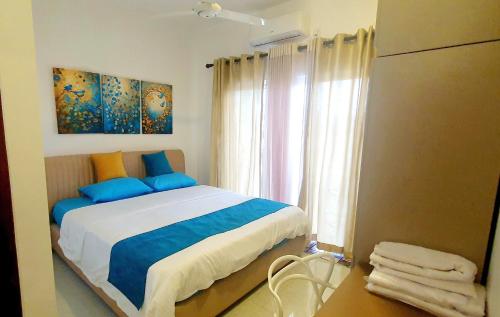 Postel nebo postele na pokoji v ubytování Colombo Flemington Apartments