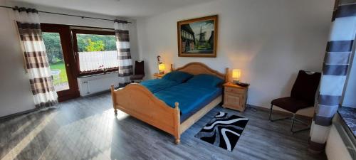 Ένα ή περισσότερα κρεβάτια σε δωμάτιο στο Ferienhaus Waldblick