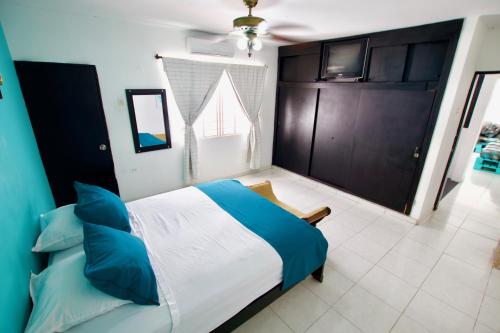 Postel nebo postele na pokoji v ubytování QuillaHost Guesthouse