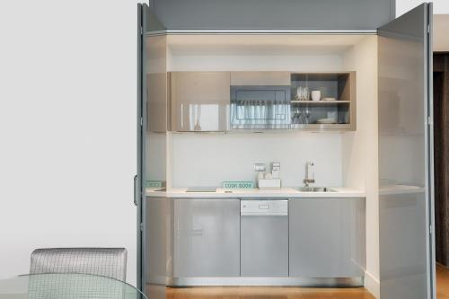 a kitchen with a sink and a counter at Le Meridien Istanbul Etiler in Istanbul