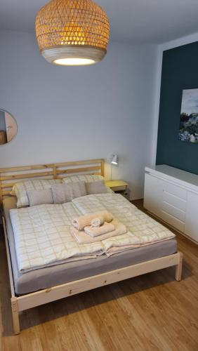 Postel nebo postele na pokoji v ubytování Ferienwohnung AM SPREEUFER