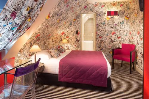 מיטה או מיטות בחדר ב-Hotel Best Western Anjou Lafayette