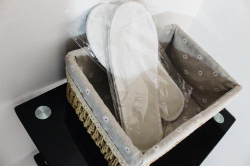 a bag of panties sitting on a black stand at Caryolba hometel - Calapan in Calapan