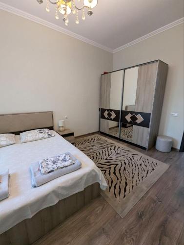 Postel nebo postele na pokoji v ubytování Elena Apartment
