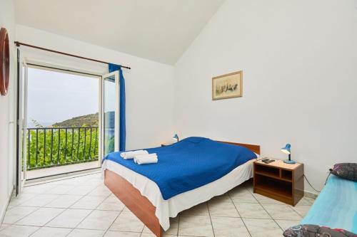 Postel nebo postele na pokoji v ubytování Holiday apartment in Saplunara with sea view, balcony, air conditioning, WiFi 5197-2