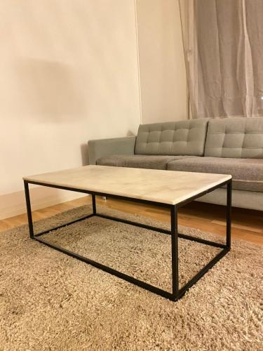 Ruang duduk di Cozy 2-Room Kallhäl Appartment