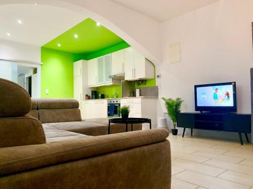 Televízia a/alebo spoločenská miestnosť v ubytovaní Centrally located Apartment Vienna included Netflix
