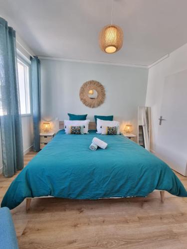 Ένα ή περισσότερα κρεβάτια σε δωμάτιο στο Opaline - centre-ville