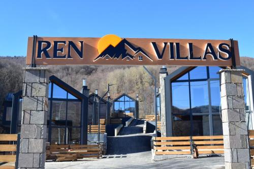 a entrance to a ski resort with a sign at Ren Villas in Mavrovo