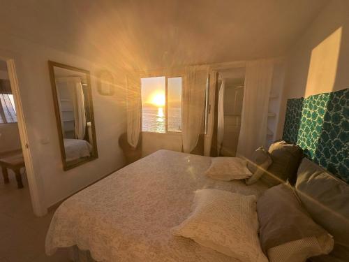 En eller flere senge i et værelse på Seaview