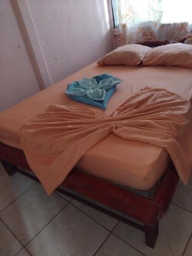 Ένα ή περισσότερα κρεβάτια σε δωμάτιο στο Monkey Beach House