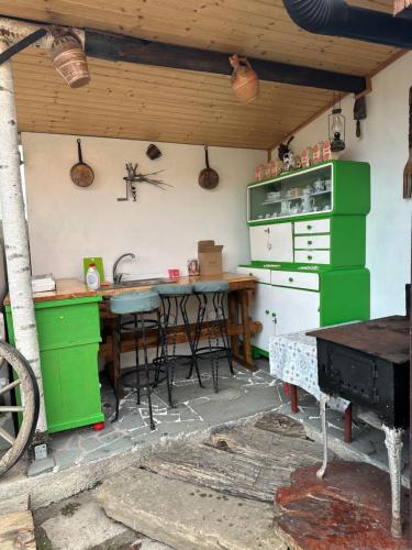 Kuchyň nebo kuchyňský kout v ubytování Casa Cezara