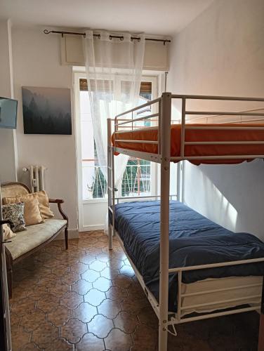 Postel nebo postele na pokoji v ubytování La casa di Minnie con box privato