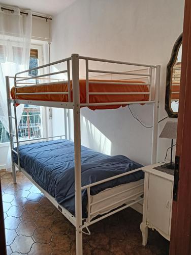 Postel nebo postele na pokoji v ubytování La casa di Minnie con box privato
