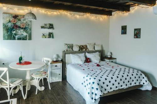 Postel nebo postele na pokoji v ubytování Hauptman apartman