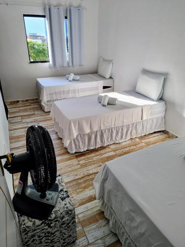 Postel nebo postele na pokoji v ubytování Qt "Íapoi"