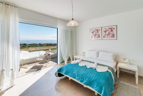 Ένα ή περισσότερα κρεβάτια σε δωμάτιο στο Villa Galene Del Mar