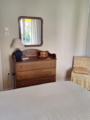 Postel nebo postele na pokoji v ubytování Itea's Garden House