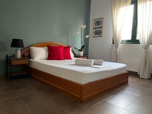 Postel nebo postele na pokoji v ubytování Ktima Nostos