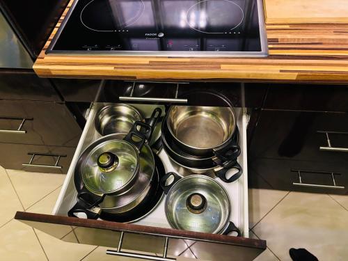 Η κουζίνα ή μικρή κουζίνα στο BLA Apartman