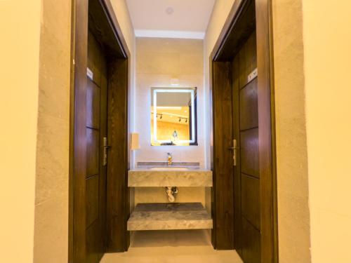 Koupelna v ubytování Petra Karam Hotel