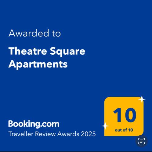 a yellow sign with the text wanted to theatre square apartments at Theatre Square Apartments in Novi Sad