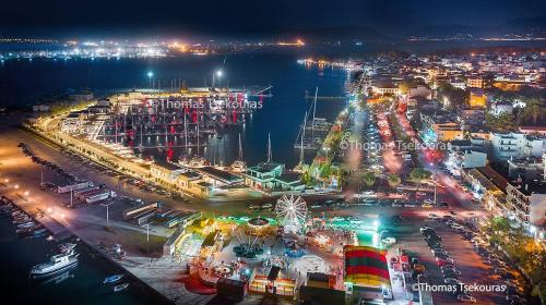 an aerial view of a harbor at night at The Best Choice in Preveza
