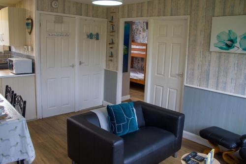 Гостиная зона в The Glade, Penstowe Holiday Park, Kilkhampton