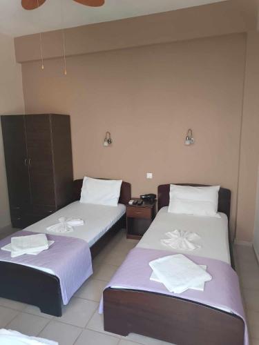 Кровать или кровати в номере GIOTAS Apartments