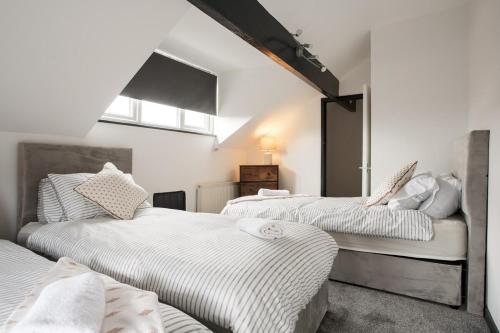 Ένα ή περισσότερα κρεβάτια σε δωμάτιο στο 3BR Accommodation in Leeds - Perfect for family
