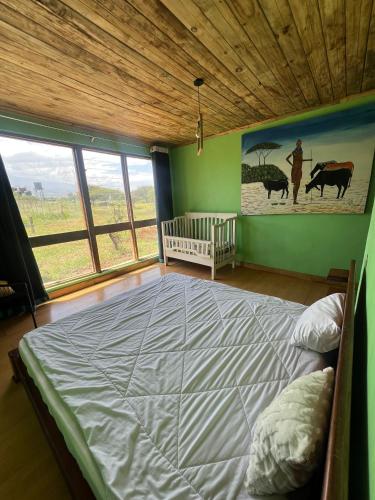 Gallery image of Amboseli Glass house in Oloitokitok 