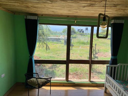 Gallery image of Amboseli Glass house in Oloitokitok 