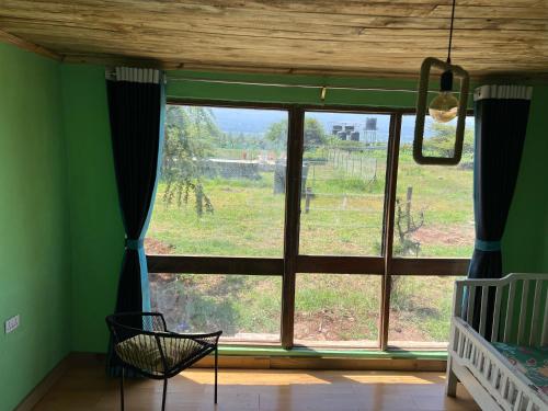 Gallery image of Amboseli Glass house in Oloitokitok 