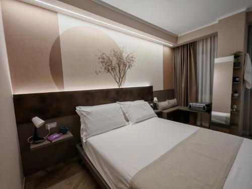 Postel nebo postele na pokoji v ubytování EFFE4 Lovely Room