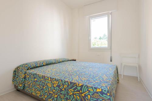 リニャーノ・サッビアドーロにあるVenusの白い部屋(窓付)のベッドルーム1室(ベッド1台付)
