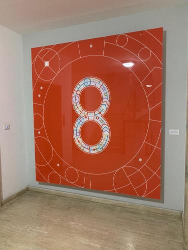 a large red wall with a number eight on it at station 27 in Perugia