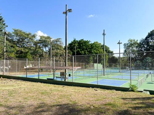 a tennis court with two tennis courts at Discover The Best Area of Coronado with Pool in Chame