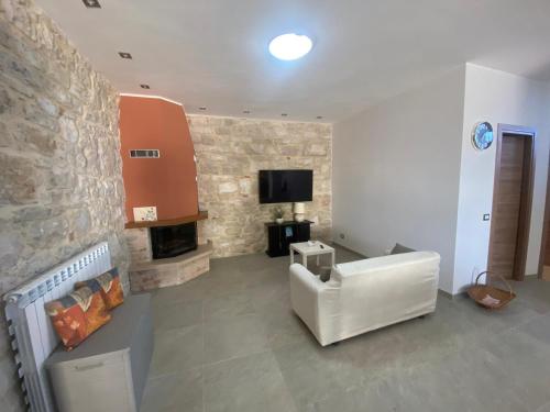 Μια τηλεόραση ή/και κέντρο ψυχαγωγίας στο Lux Appartamento