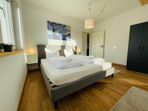 Ένα ή περισσότερα κρεβάτια σε δωμάτιο στο Dill Apartment Pleinfeld am Brombachsee III