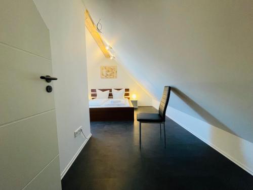 Ένα ή περισσότερα κρεβάτια σε δωμάτιο στο Dill Apartment Pleinfeld am Brombachsee III