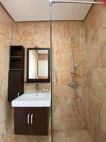 Ένα μπάνιο στο Valeur Penthouse Tirana City Center